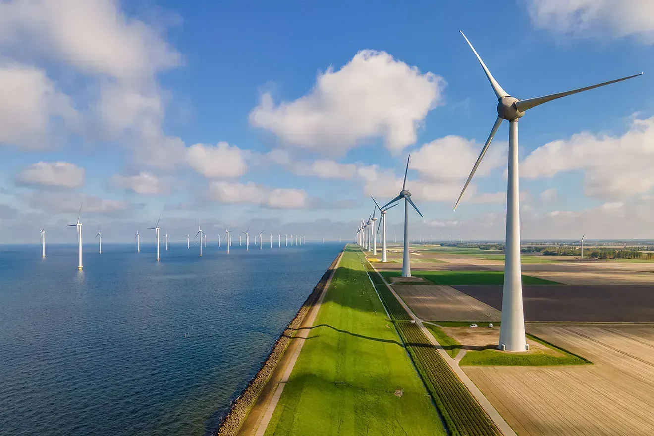 windmill-turbines-at-sea-generate-green-energy-in-2023-01-06-20-41-09-utc